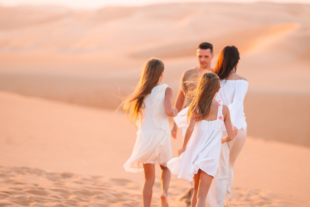 tourists in merzouga desert with marrakesh tours company